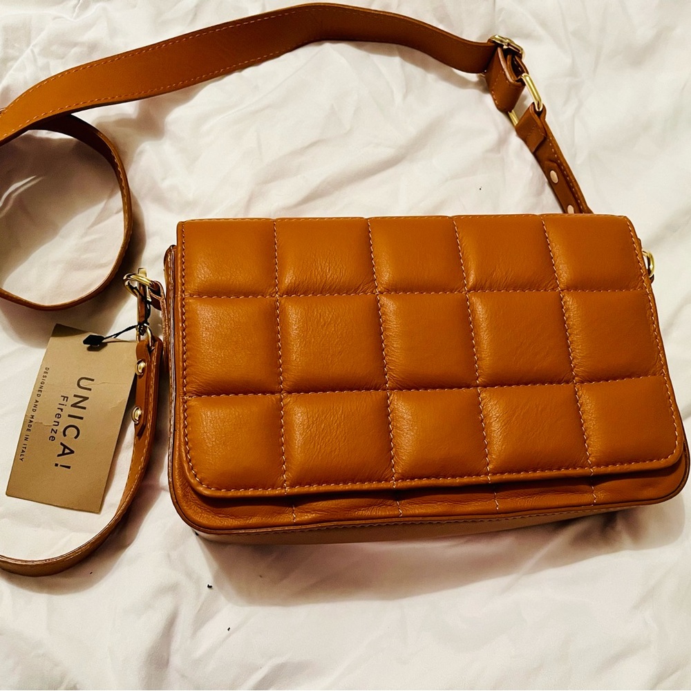 Unica purse made in Italy. NWT. Perfect condition. Genuine leather. Gorgeous.
